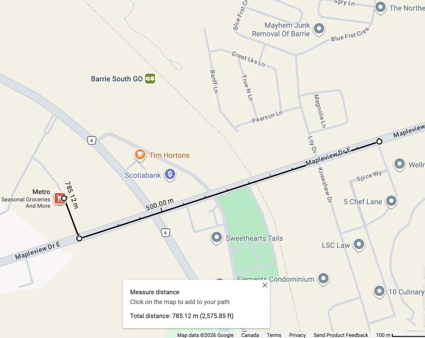 Google Maps measurement showing an approximately 785-metre route between the Metro grocery store and the Mapleview condominium area.